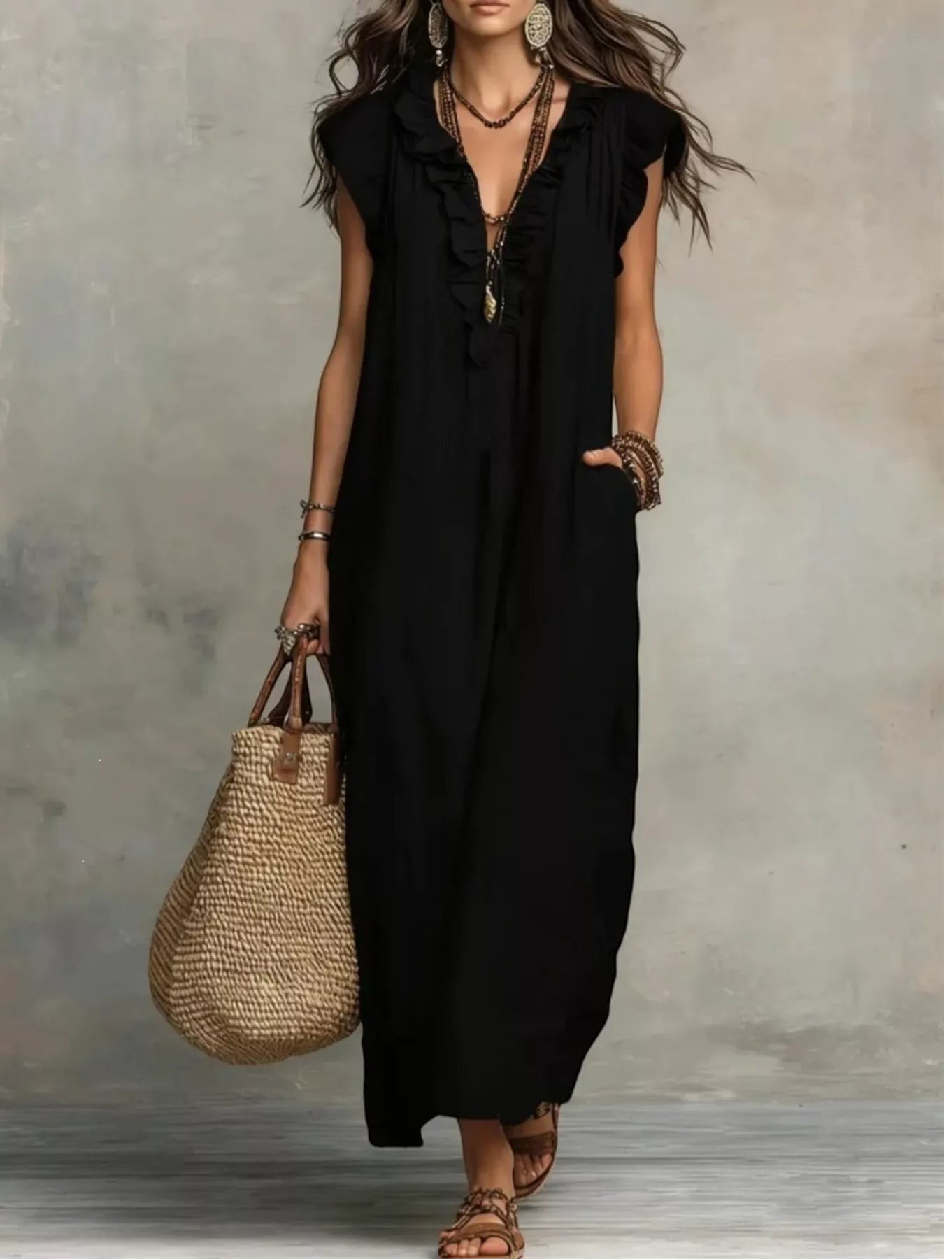 Health Hive black ruffled V-neck maxi dress with cap sleeves and pockets, styled with a woven straw tote bag.