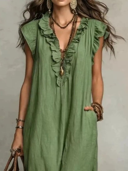 Health Hive olive green maxi dress with ruffled V-neck, cap sleeves, and side pockets in a relaxed polyester fabric.
