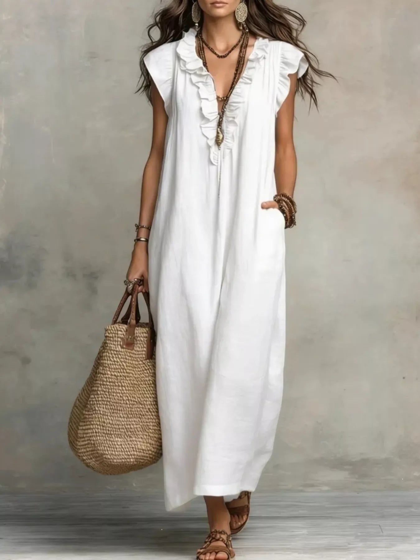 Health Hive white ruffled V-neck maxi dress with cap sleeves and pockets, styled with a straw tote bag.